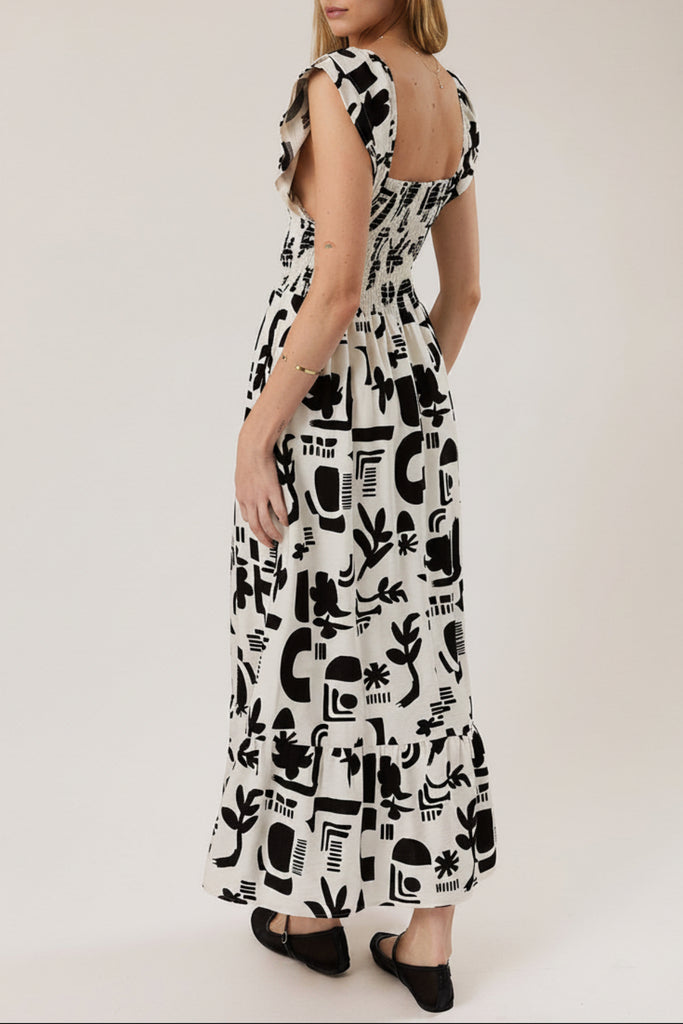 Stolen Glances Abstract Smocked Ruffle Dress