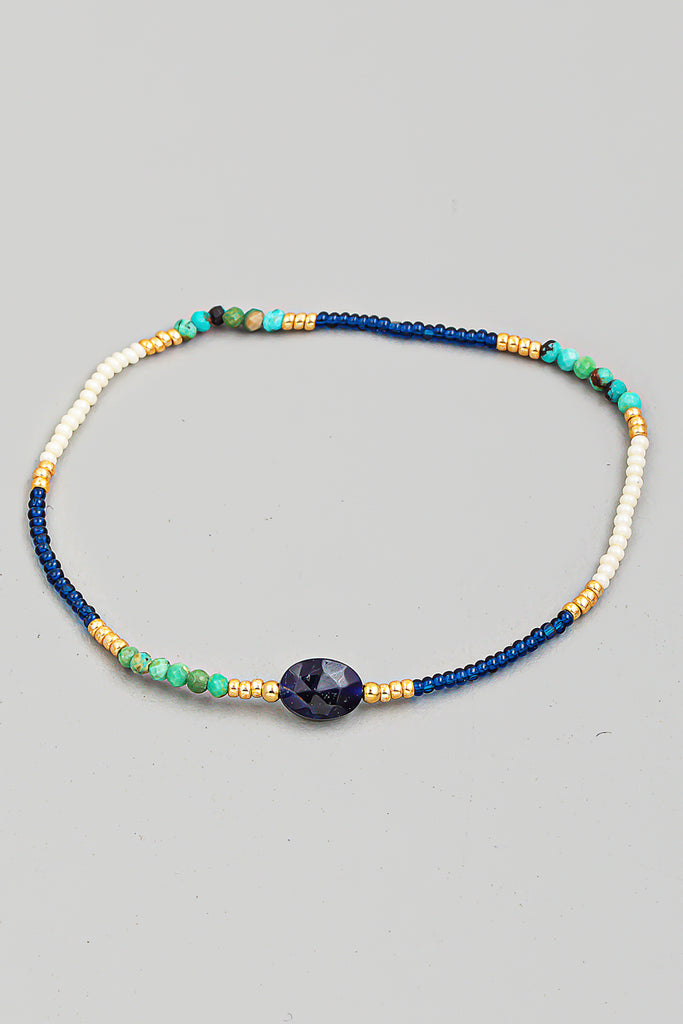 Delicate Beaded Bracelet In Brown With Accent Stone In Blue Multi