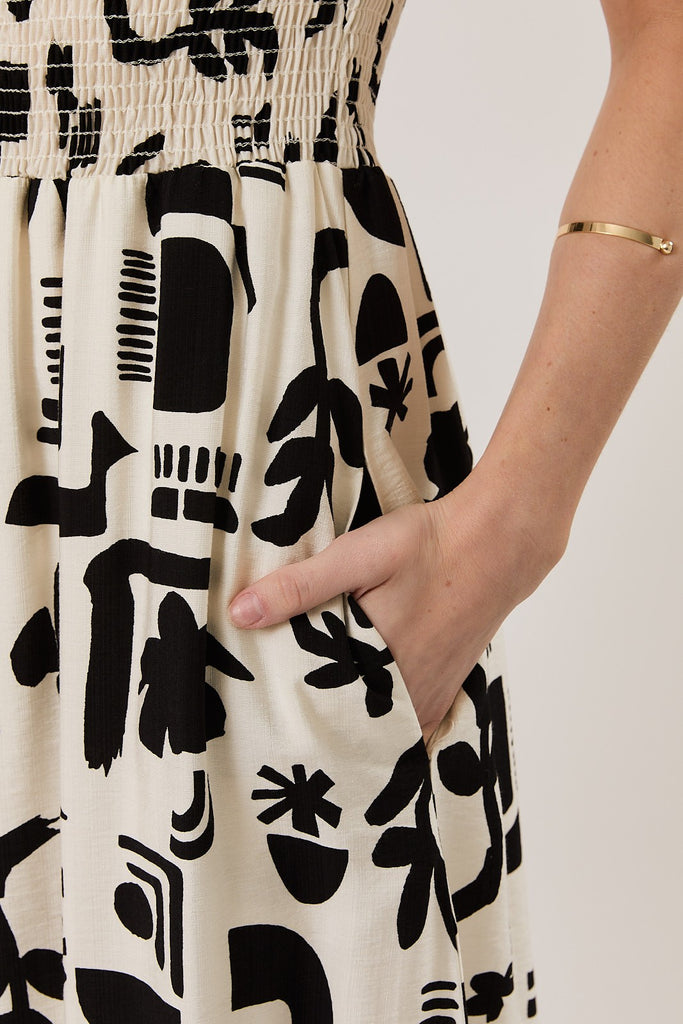 Stolen Glances Abstract Smocked Ruffle Dress