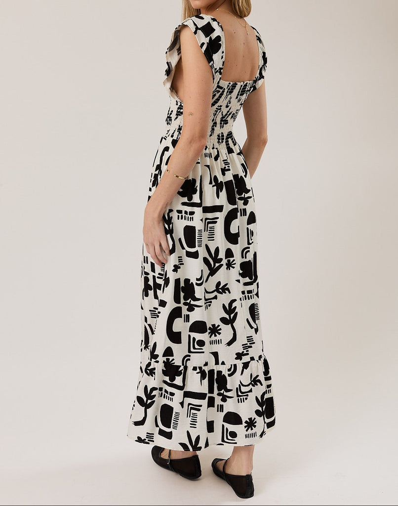 Stolen Glances Abstract Smocked Ruffle Dress