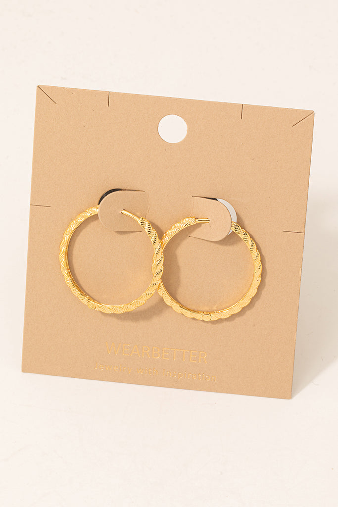 Twisted Hoop Earrings in Gold