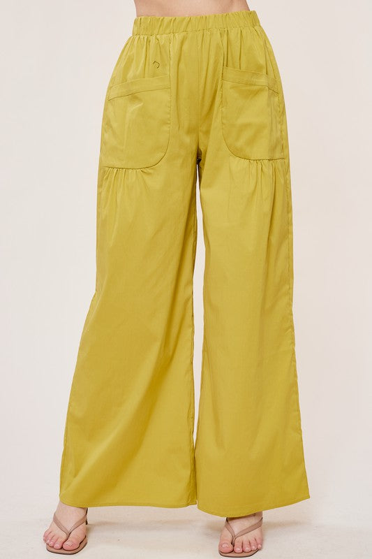 It Takes Two Smocked Top And Wide Leg Pant Set In Pistachio