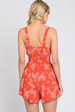 Made Me Blush Floral Printed Front Twist Smocked Romper In Red