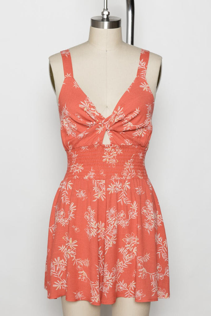 Made Me Blush Floral Printed Front Twist Smocked Romper In Red